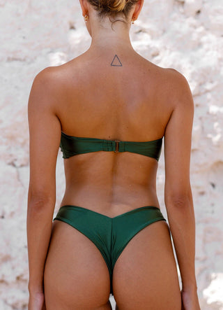 Model wearing Anjuum Ohm bandeau Top Forest Green.